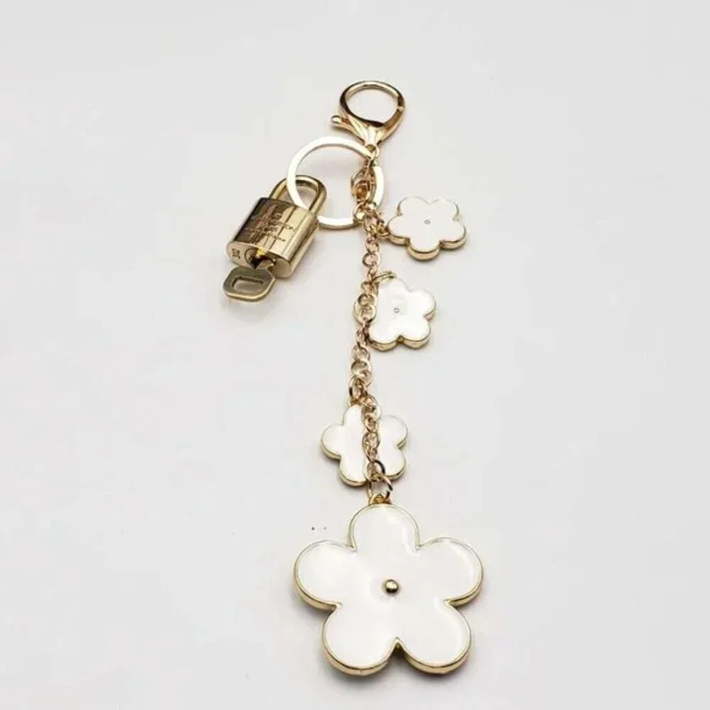 Authentic Louis Vuitton Gold Lock & Key ✨ Bag Charm Unbranded Flower Keychain - Picture 2 of 6